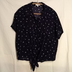 Navy with white flowers front tie blouse
